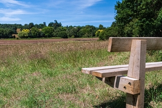 Commemorative bench at Ail Meadow (c) Paul Lloyd