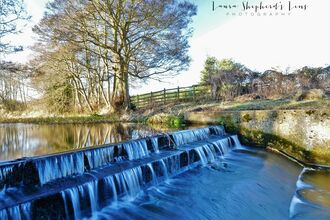 The spillway at Titley Pool c. Laura Shepherd