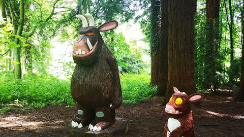The Gruffalo and Gruffalo's Child carved wooden sculptures amongst the redwoods at Queenswood Country Park