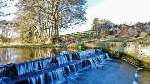 The spillway at Titley Pool c. Laura Shepherd