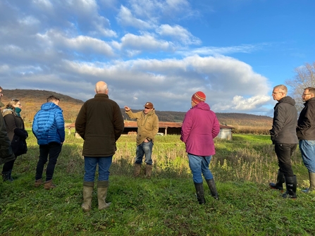 Group of people stood in field